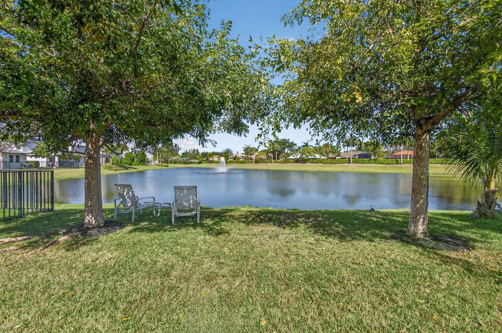 Photo of 1822 Lake Cove Drive, Lake Worth, FL 33460 (MLS # R11153399)