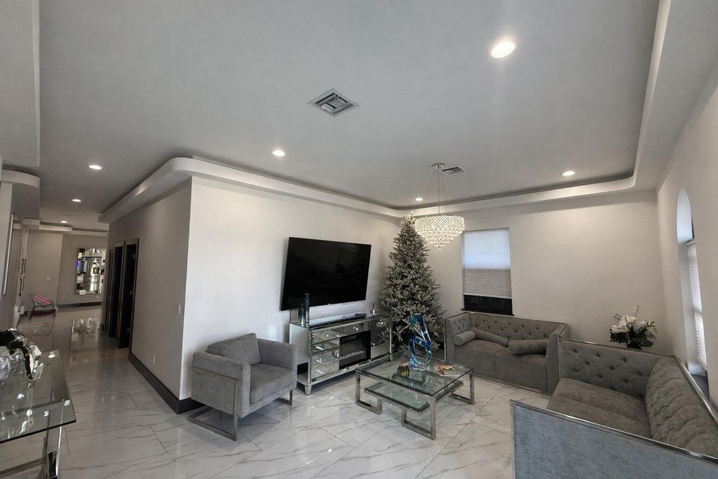 Photo of 725 Mercury Street, West Palm Beach, FL 33406 (MLS # B26008355)