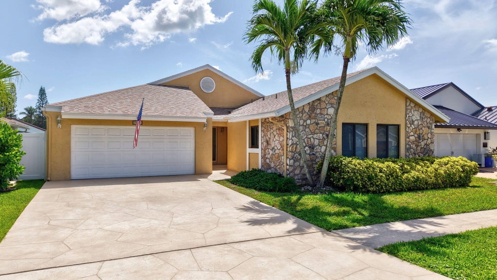 Photo of 20986 Rustlewood Avenue, Boca Raton, FL 33428 (MLS # B26052360)