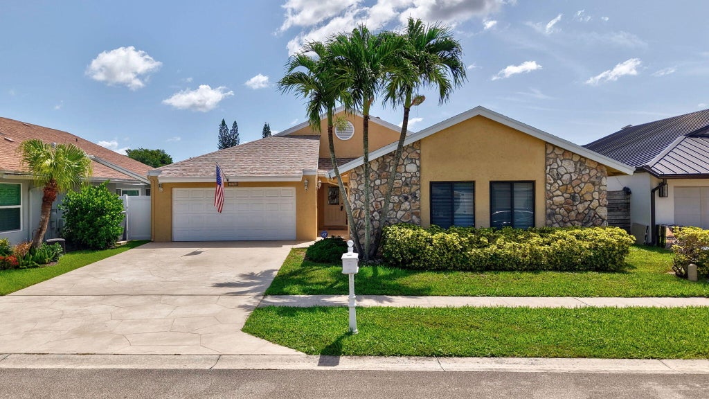 Photo of 20986 Rustlewood Avenue, Boca Raton, FL 33428 (MLS # B26052360)