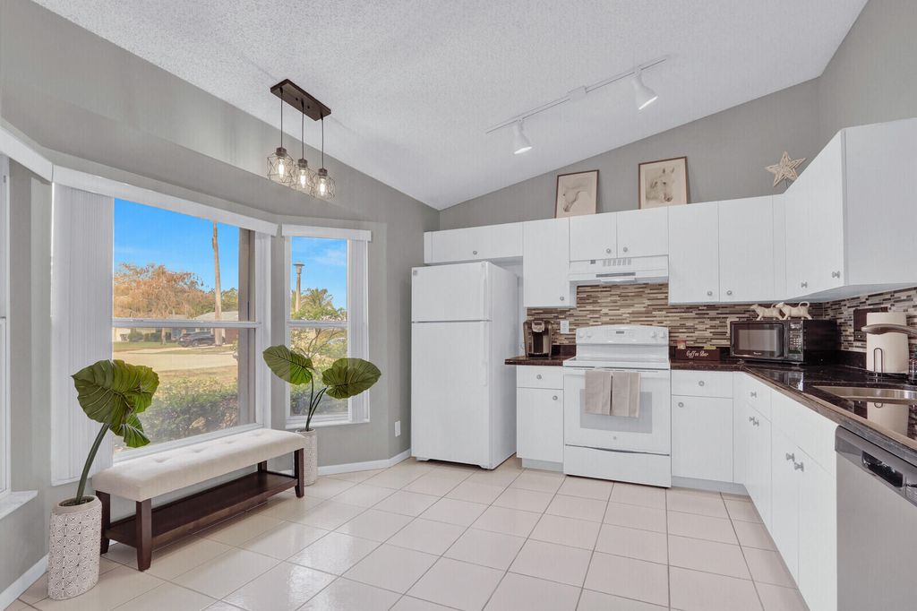 Photo of 1544 Old Cypress Trail, Wellington, FL 33414 (MLS # R11168373)