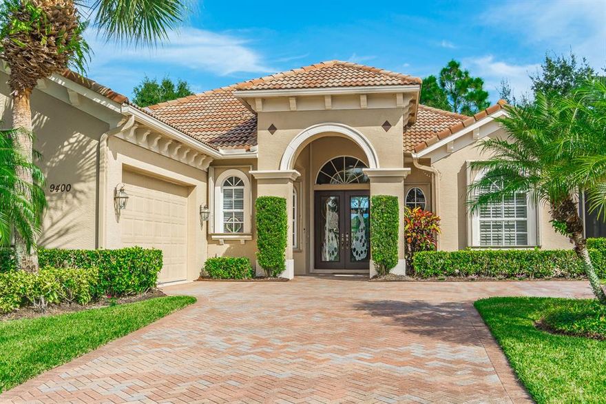 Stunning views of the Green and Lake from the back porch of this spectacular home, situated on the Dye Course in PGA Village. Take your pick of the 3 PGA Championship Golf Courses or play Legacy, a private Golf Course and Tennis Club. Great Room floor plan with three En Suite Bedrooms plus Den/Office, Open kitchen, eating area & bar that opens up to a 22 x 22 extended Lanai to enjoy Florida Living at its Best.
Kitchen renovated in 3/2018 with 42'' Maple Cabinets, SS Appliances, Granite countertops throughout. Replaced Air Conditioners , Washer/Dryer & Hot Water Heater in 2018.
 Installed Wood Floors, in Master & Office. Generator Bypass Switch, Gutters around the whole house as well. The best part of this Beautiful Lawn is it is Maintained by the HOA.  Come & see this  Beautiful Home!