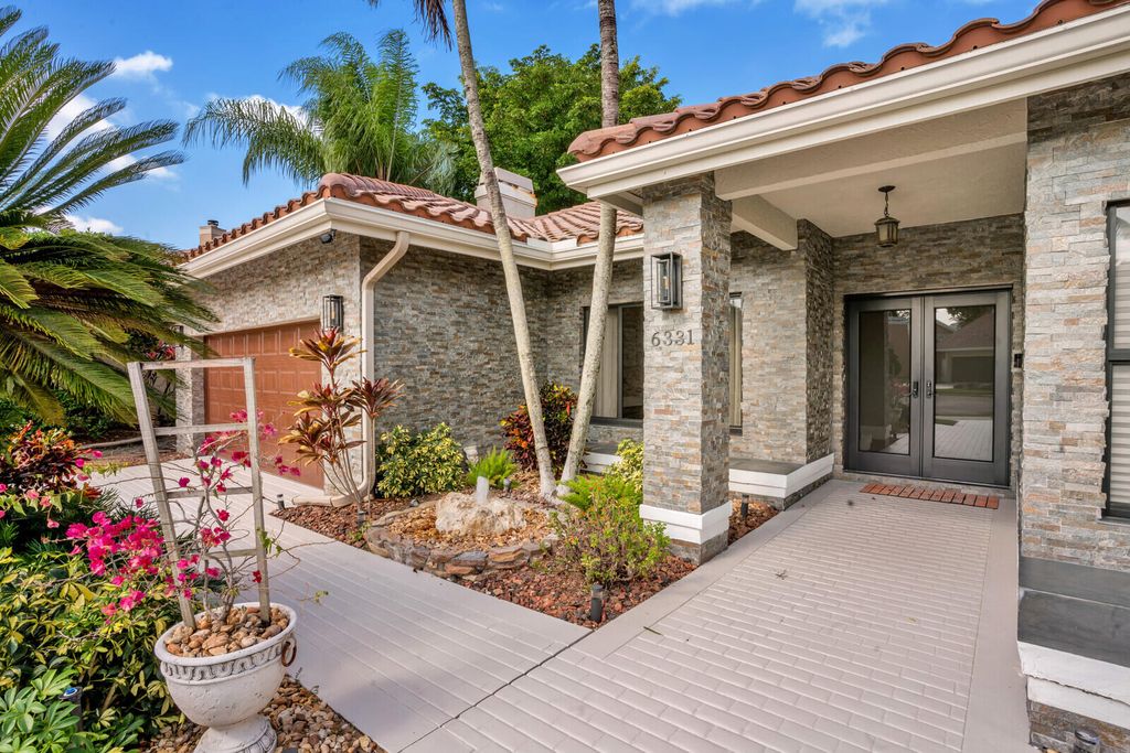 Photo of 6331 NW 60th Way, Parkland, FL 33067 (MLS # R10933416)
