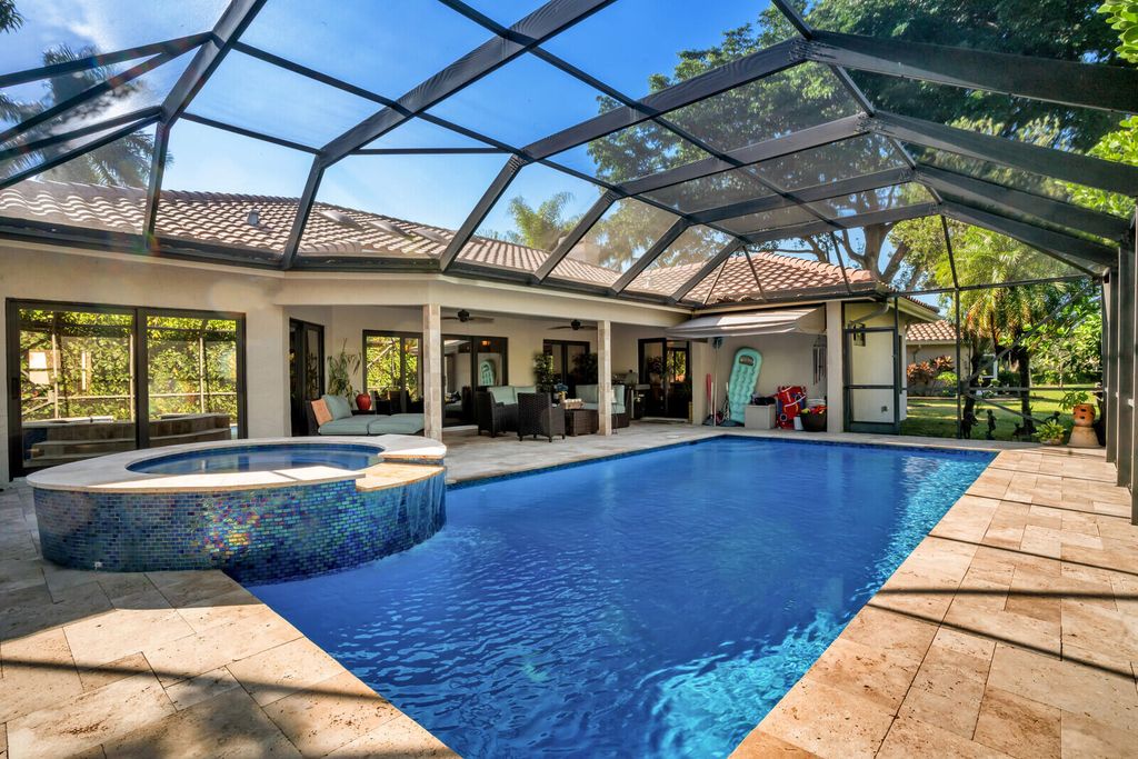 Photo of 6331 NW 60th Way, Parkland, FL 33067 (MLS # R10933416)