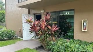 Photo of 10053 Winding Lake Road #104, Sunrise, FL 33351 (MLS # B26075130)