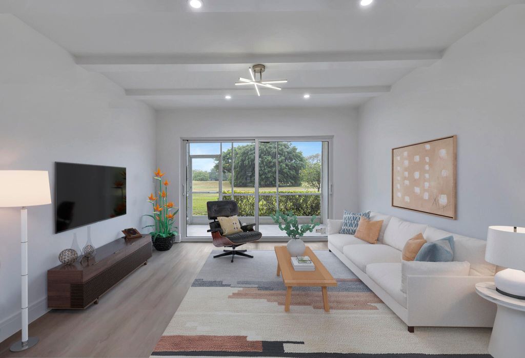 Photo of 3100 N Palm Aire Drive #106, Pompano Beach, FL 33069 (MLS # B26026945)