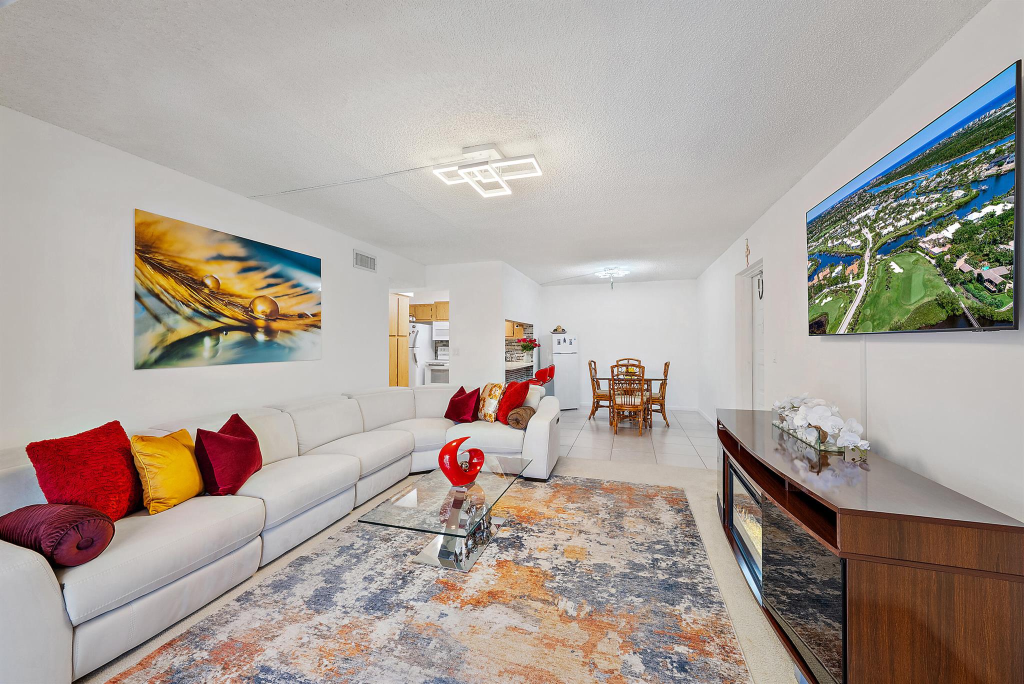 Immaculate & Stylish Condo in Pine Ridge - Active 55+ Community - No rental restrictions! Discover this impeccably maintained 2-bedroom, 2-bathroom residence in the sought-after Pine Ridge community. Ideally located in the heart of West Palm Beach, Pine Ridge is celebrated for its tranquil lakes, scenic walking trails, pristine grounds, and unbeatable convenience--just minutes from Palm Beach International Airport, the Wellington Mall, public Golf Courses, Hthe Turnpike, major shopping, dining, and more.819 Sky Pine Way, Unit A2 has even been featured on the Association's website for its tasteful updates, well-appointed furnishings, and welcoming blend of warmth and modern style.Experience the best of Florida living--sunshine, comfort, and affordability all in one beautiful home