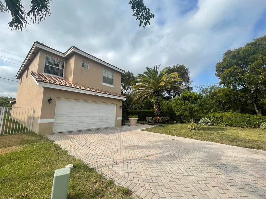 Photo of 4066 Crescent Creek Street, Coconut Creek, FL 33073 (MLS # R10874806)