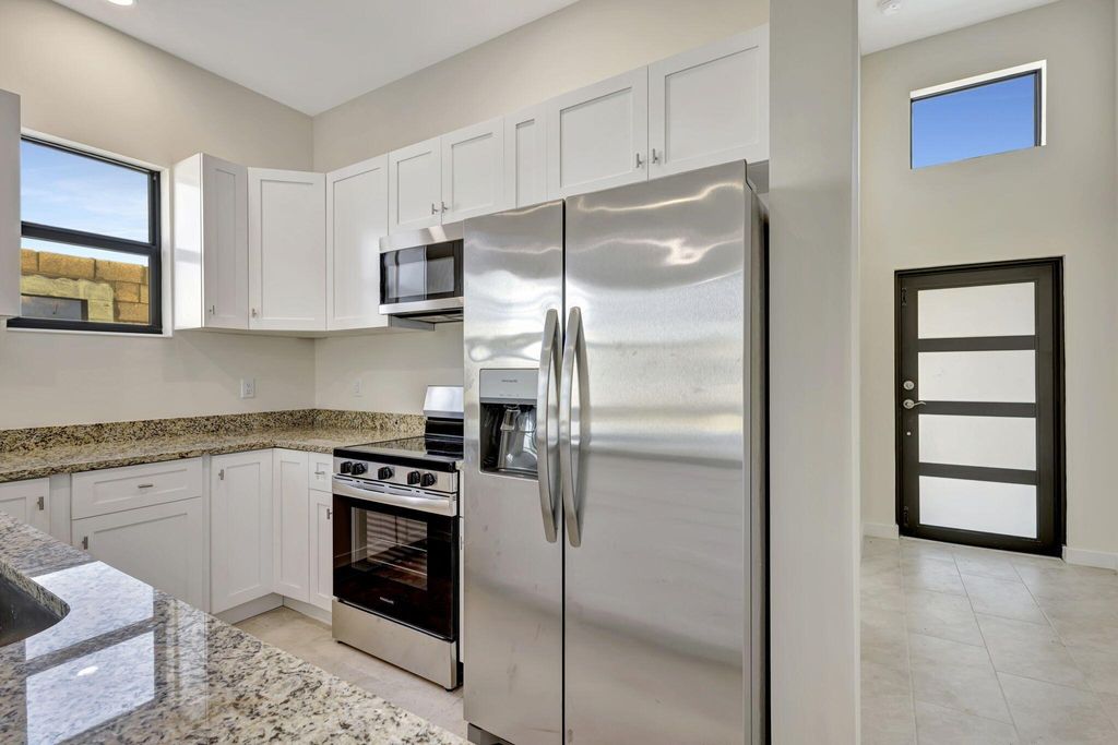 Photo of 132 Seminole Court, Indiantown, FL 34956 (MLS # R11102432)