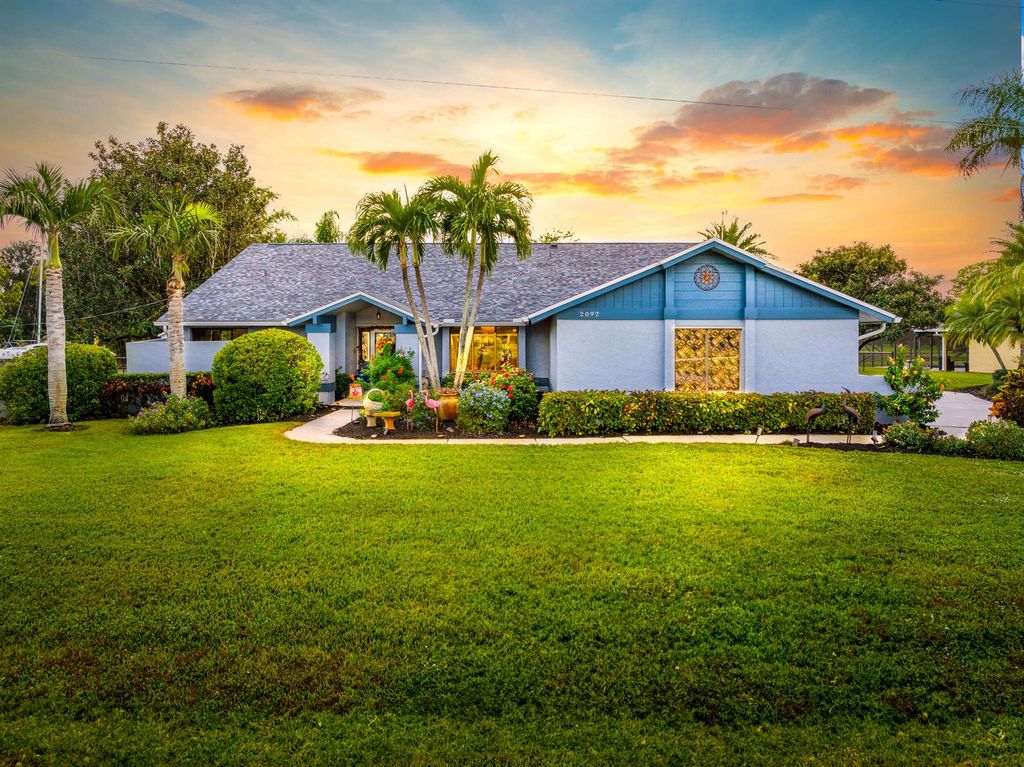 Photo of 2092 SE Pyramid Road, Port Saint Lucie, FL 34952 (MLS # R11041251)