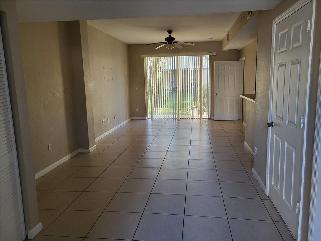 Photo of 1957 Freeport Lane #1957, Riviera Beach, FL 33404 (MLS # F10551228)