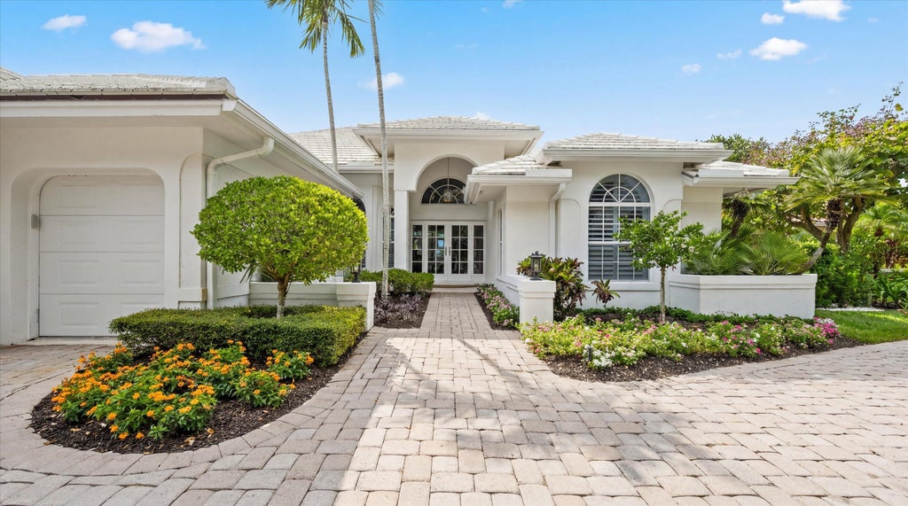 Photo of 116 ECHO Drive, Jupiter, FL 33458 (MLS # B26075081)