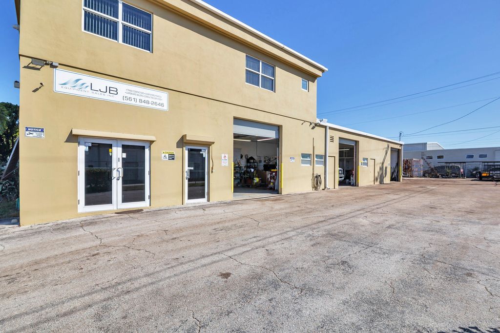 Photo of 109 Reed Road, Lake Park, FL 33403 (MLS # R11163404)