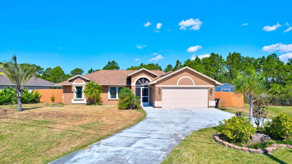 Photo of 2530 SW Savage Boulevard, Port Saint Lucie, FL 34953 (MLS # R10982112)
