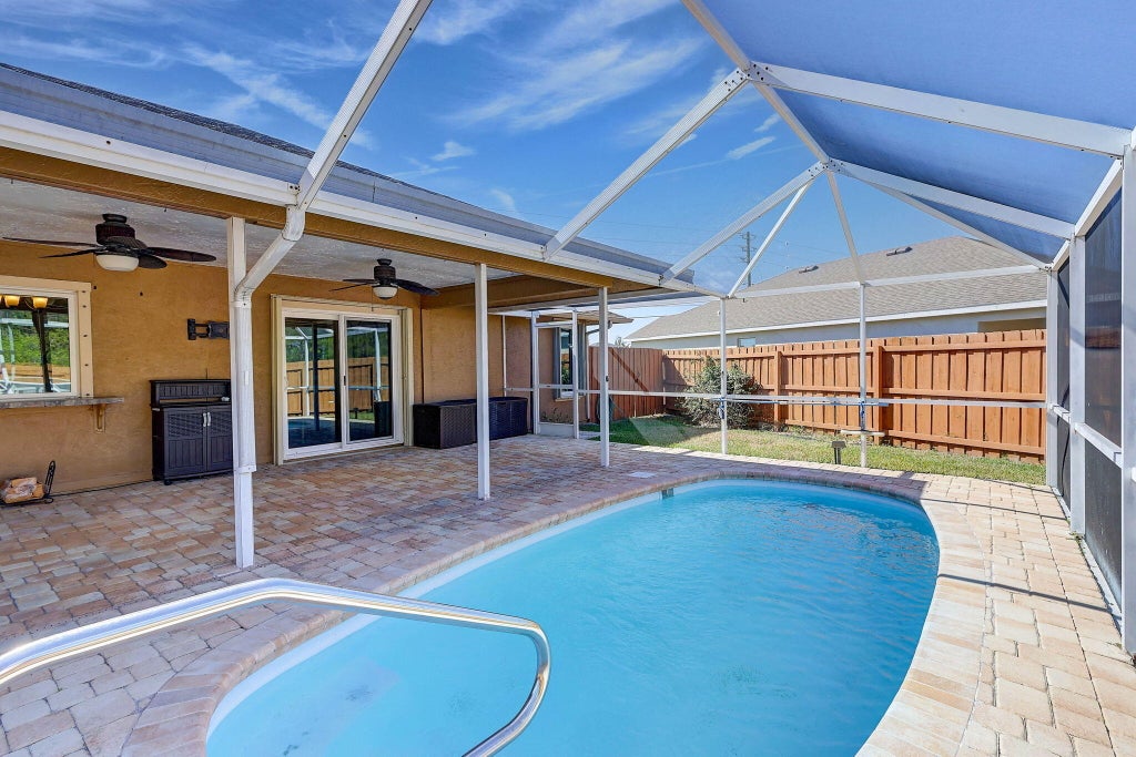 Photo of 2530 SW Savage Boulevard, Port Saint Lucie, FL 34953 (MLS # R10982112)