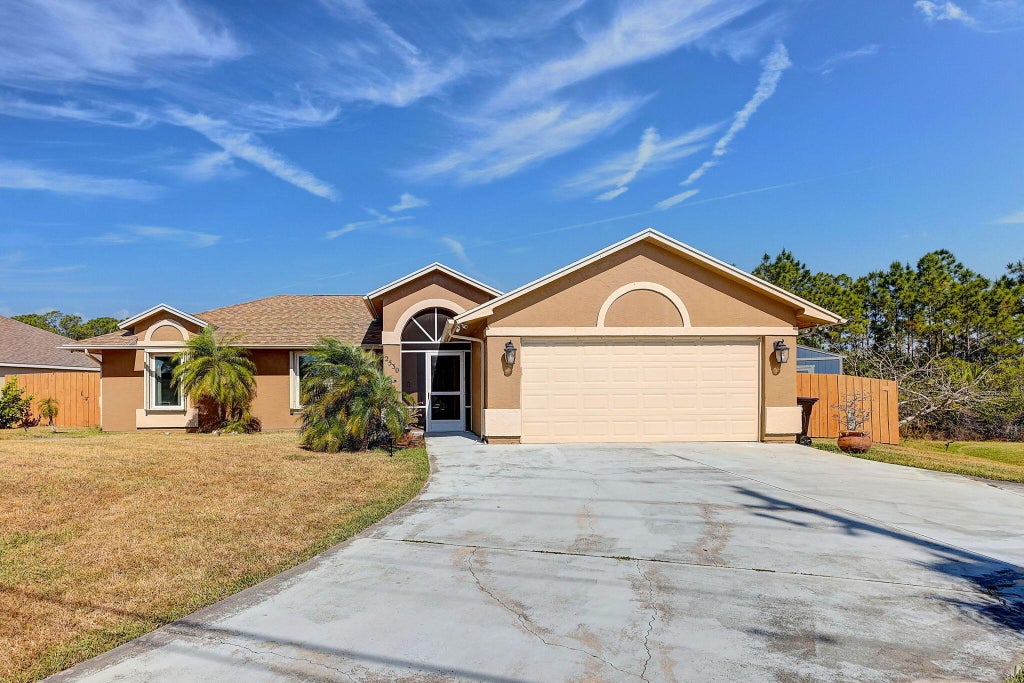 Photo of 2530 SW Savage Boulevard, Port Saint Lucie, FL 34953 (MLS # R10982112)