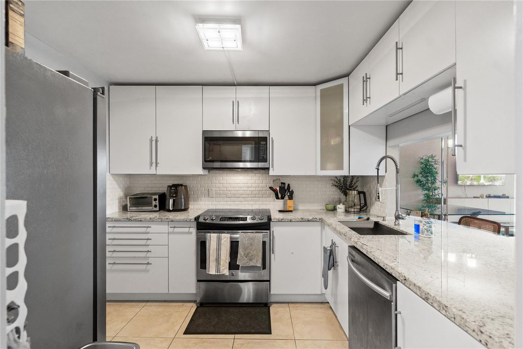 Photo of 3955 N Nob Hill Rd #307, Sunrise, FL 33351 (MLS # F10531414)