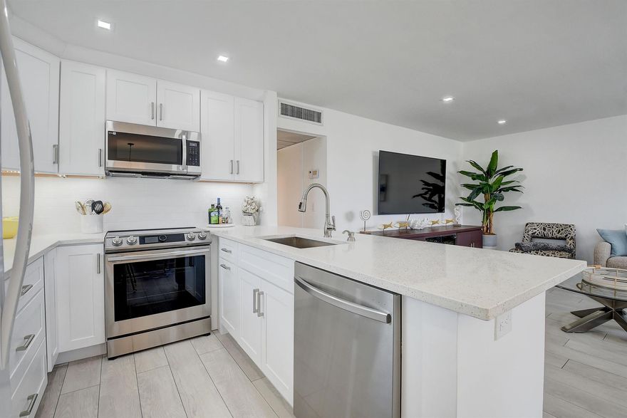 Fully furnished, beautifully updated, 2 bedroom, 2 full bathroom home, with laundry inside the unit, located in Kings Point Golf & Country Club (55+ community). **MOTIVATED SELLER** This turnkey unit has everything you need to feel right at home, just bring your suitcase! The renovated kitchen features quartz countertops, under cabinet lighting & soft close cabinets. The home has one of the lowest monthly HOA's in Kings Point. It is an ideal vacation home or the perfect move in ready home.This community has so much to offer including Resort Style Amenities:2 public golf courses for golfing enthusiasts: 1 18 hole Executive course renovated in 2022, and 1 shorter but still challenging Par 3 Course renovated in 2023.