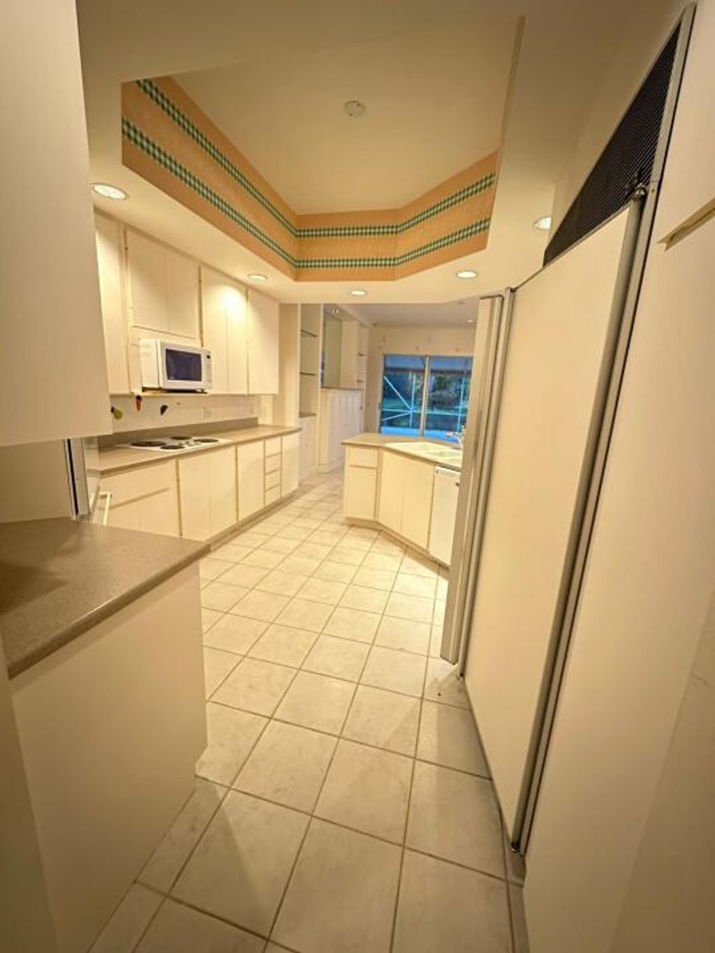 Photo of 1633 Flagler Manor Circle, West Palm Beach, FL 33411 (MLS # R10944557)