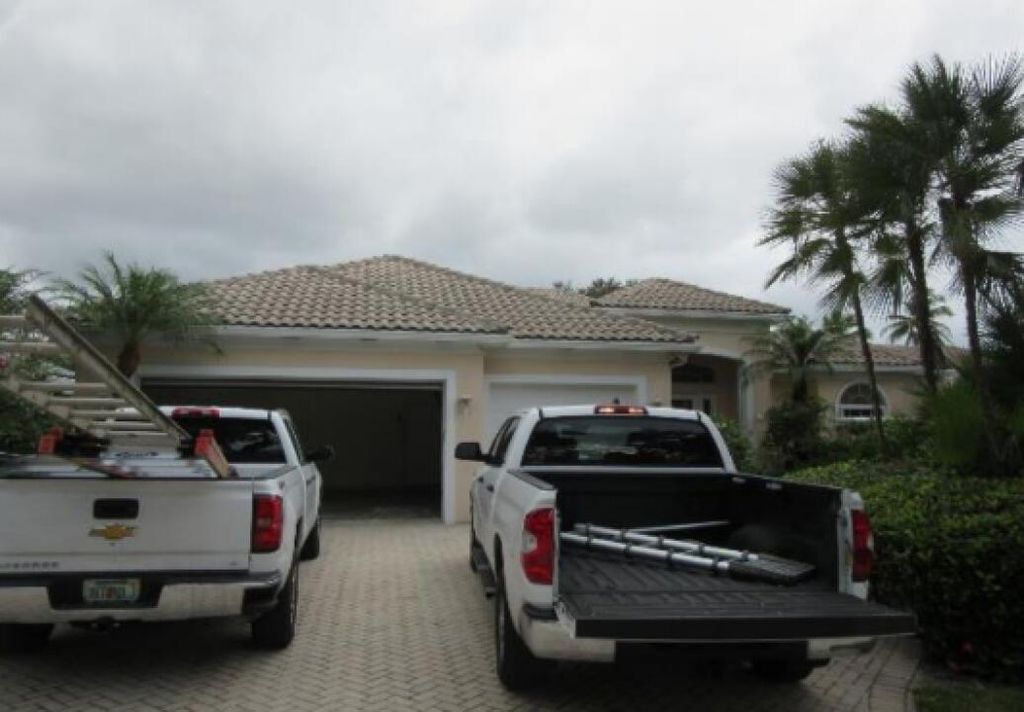 Photo of 1633 Flagler Manor Circle, West Palm Beach, FL 33411 (MLS # R10944557)