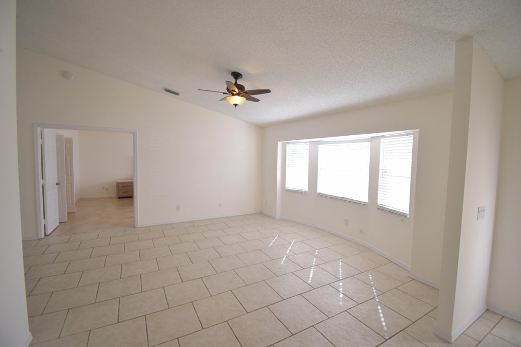 Photo of 1801 SW Grant Avenue, Port Saint Lucie, FL 34953 (MLS # R10956183)