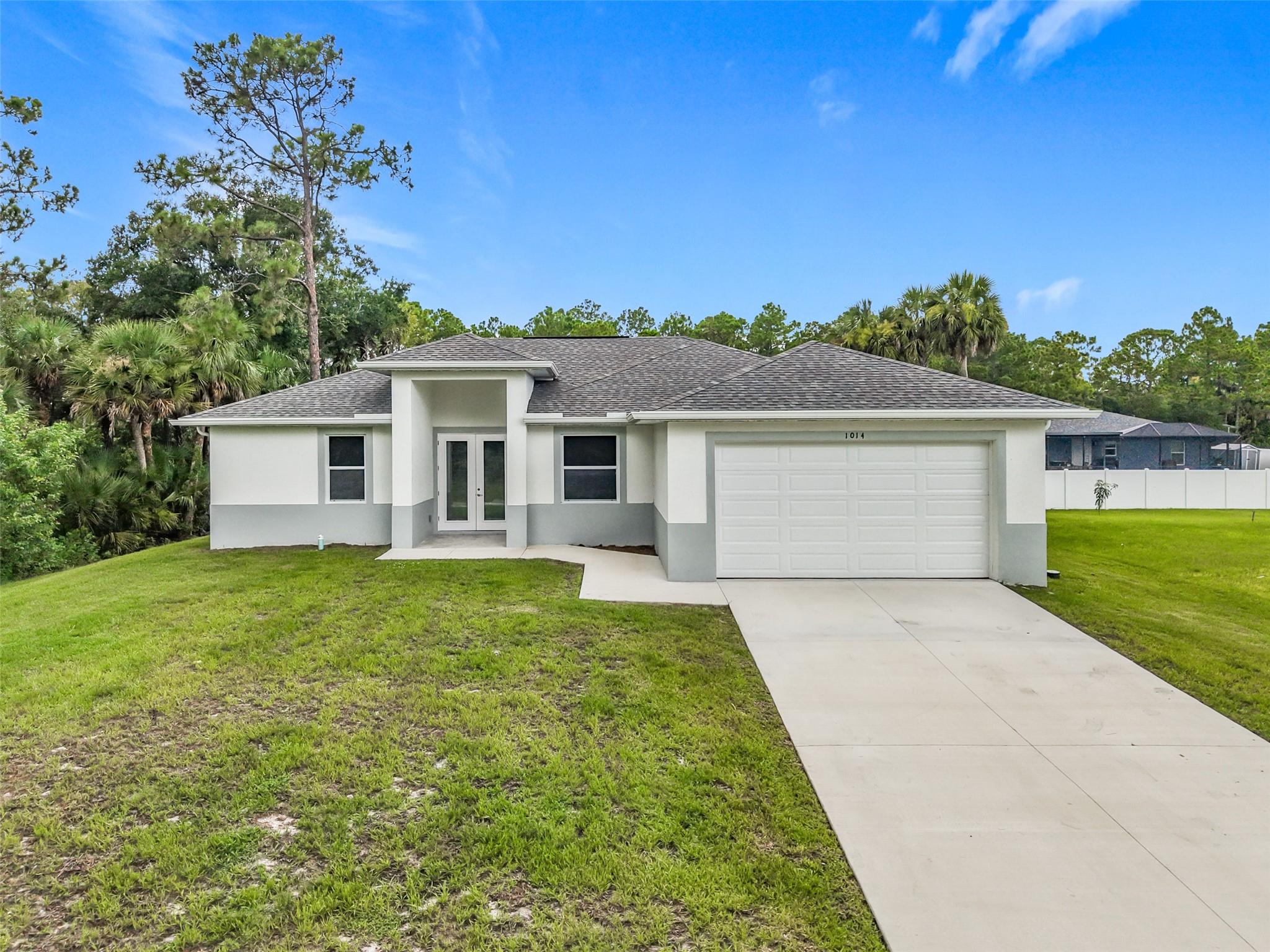 Seller offering up to $10,000 toward buyer’s closing costs with full-price offer! Nearly new and move-in ready, this 2024-built 3-bedroom + den, 2-bathroom home in Banyan Village offers the best of modern living without the hassle of builder punch lists. Enjoy custom window treatments, tile flooring throughout, white cabinetry with granite counters, ceiling fans in every room, and a spacious screened-in patio perfect for outdoor relaxation. The open-concept layout is ideal for entertaining, and the primary suite features double closets. An unexpected job relocation means a quick move. Don’t miss your chance to own this beautifully maintained home!