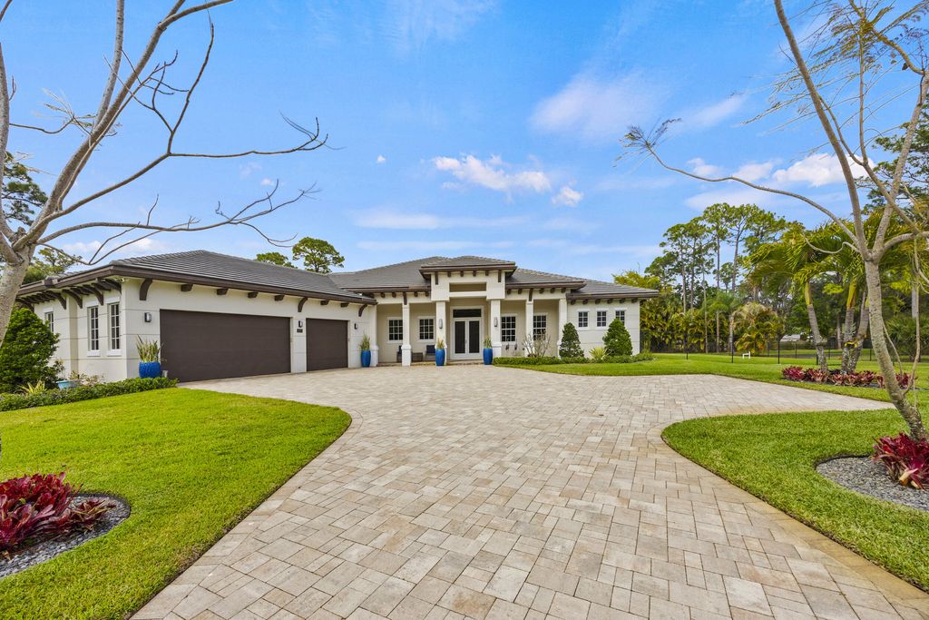 Photo of 6777 140th Lane N, Palm Beach Gardens, FL 33418 (MLS # R11170009)