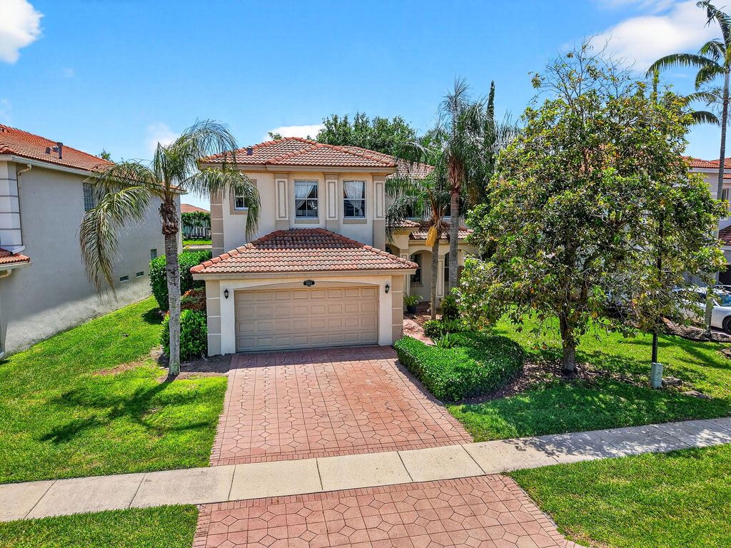 Photo of 10624 Old Hammock Way, Wellington, FL 33414 (MLS # B26012004)