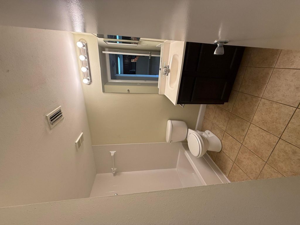 Photo of 7640 Westwood Drive #402, Tamarac, FL 33321 (MLS # B26001259)