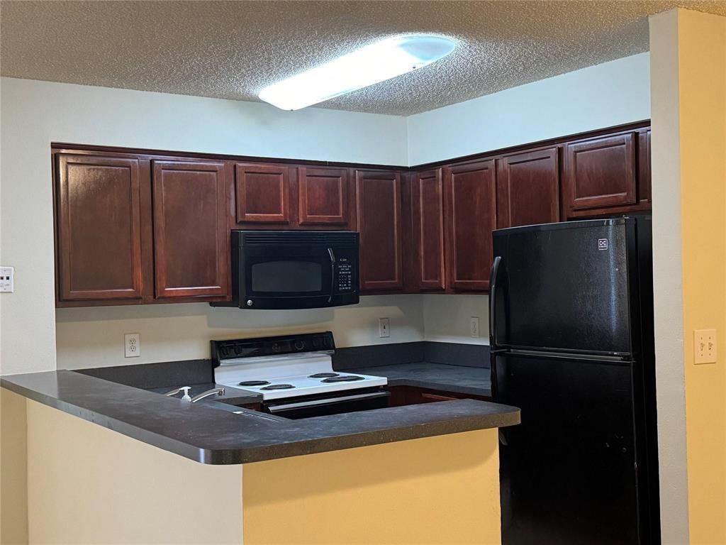 Photo of 7640 Westwood Drive #402, Tamarac, FL 33321 (MLS # B26001259)