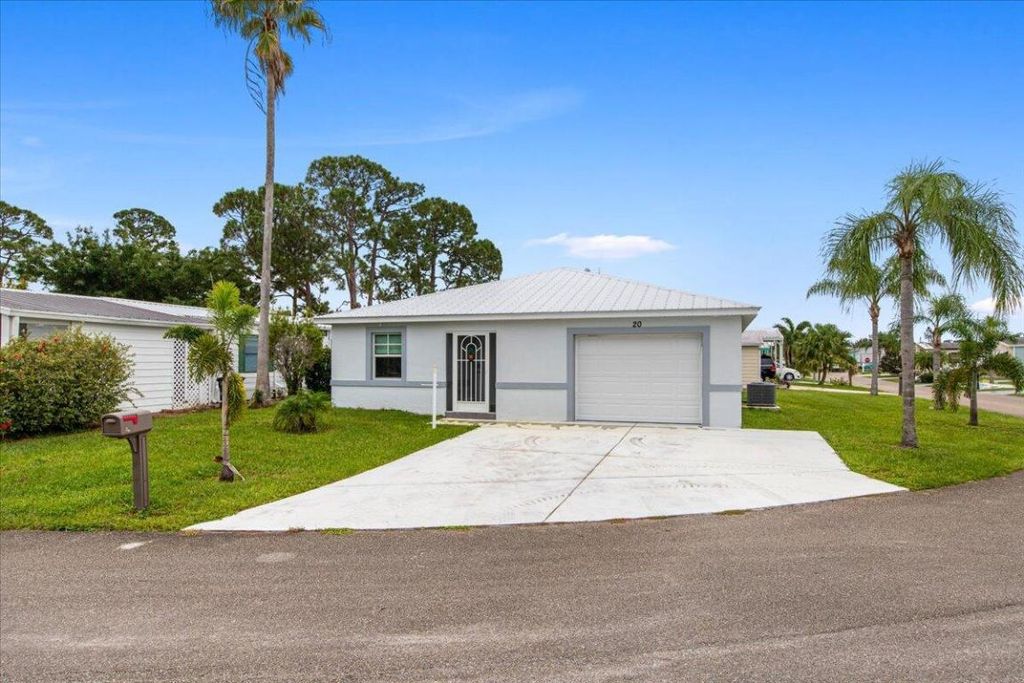 Photo of 20 Flores Del Norte, Fort Pierce, FL 34951 (MLS # R11031357)
