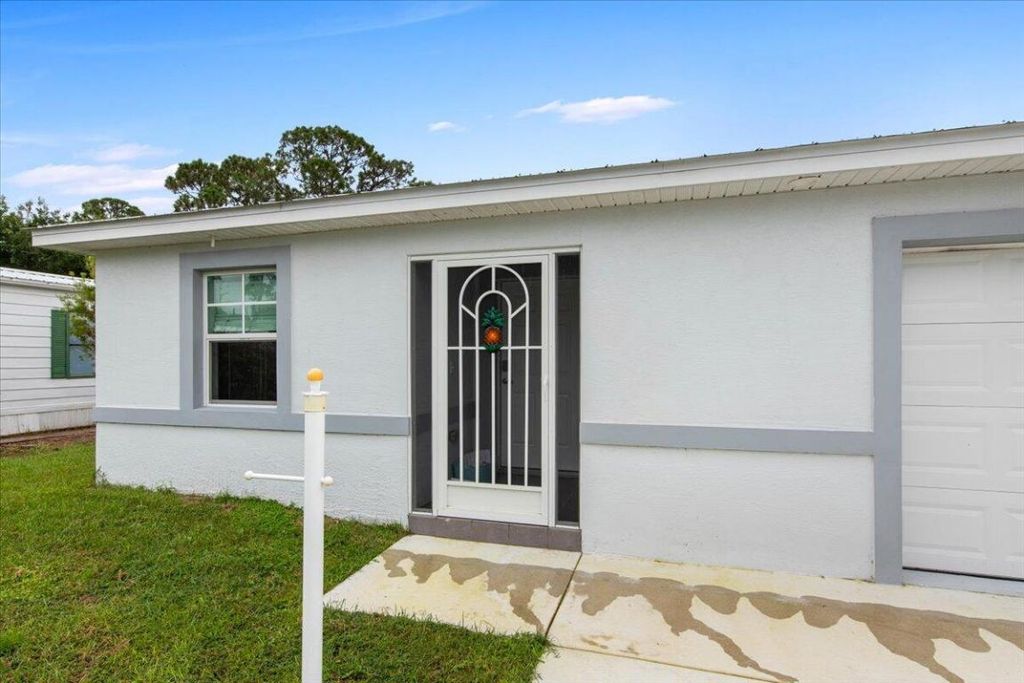 Photo of 20 Flores Del Norte, Fort Pierce, FL 34951 (MLS # R11031357)