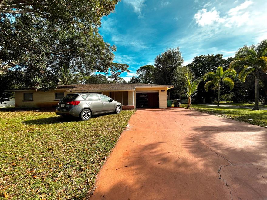 Investor Opportunity -- Cash or Hard Money Only! Solid CBS 3BR/2.5BA home offering 1,830 sq ft of living space on a 12,632 sq ft lot (0.29 acre) in the established Orange Blossom Estates community. This property features a traditional bedroom layout, spacious living areas, a converted garage, and a covered patio overlooking the expansive yard. With generous interior and exterior space, this home provides an excellent canvas to personalize and enhance. Just minutes from I-95, US-1, the Turnpike, schools, hospitals, colleges, restaurants, medical offices, and shopping. Sold AS-IS.