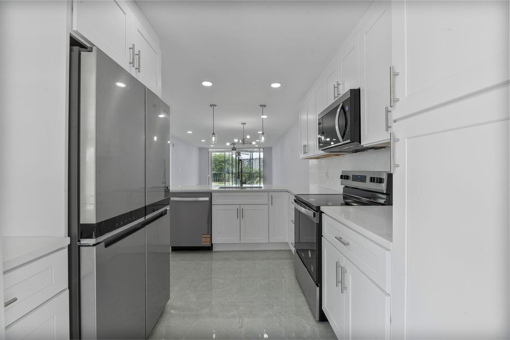 Photo of 2901 S Palm Aire Dr #306, Pompano Beach, FL 33069 (MLS # F10538394)