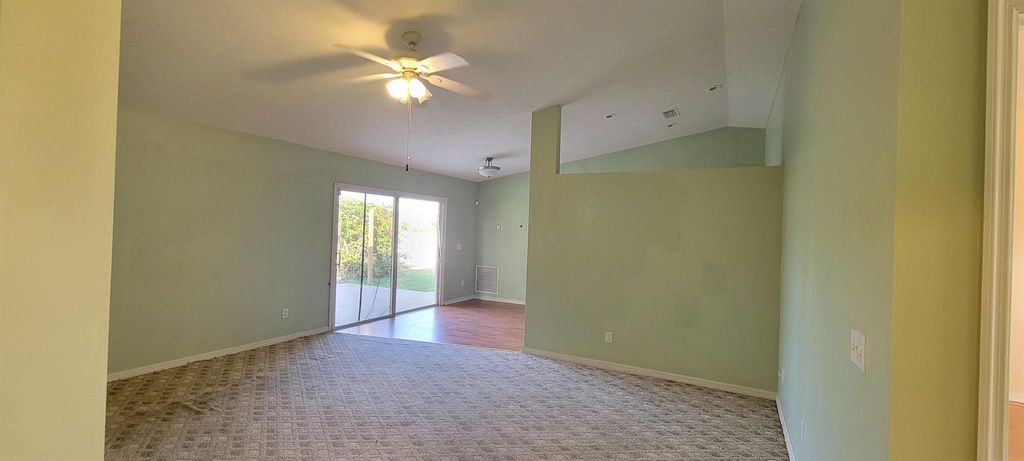 Photo of 435 SW Kabot Avenue, Port Saint Lucie, FL 34953 (MLS # R11043877)