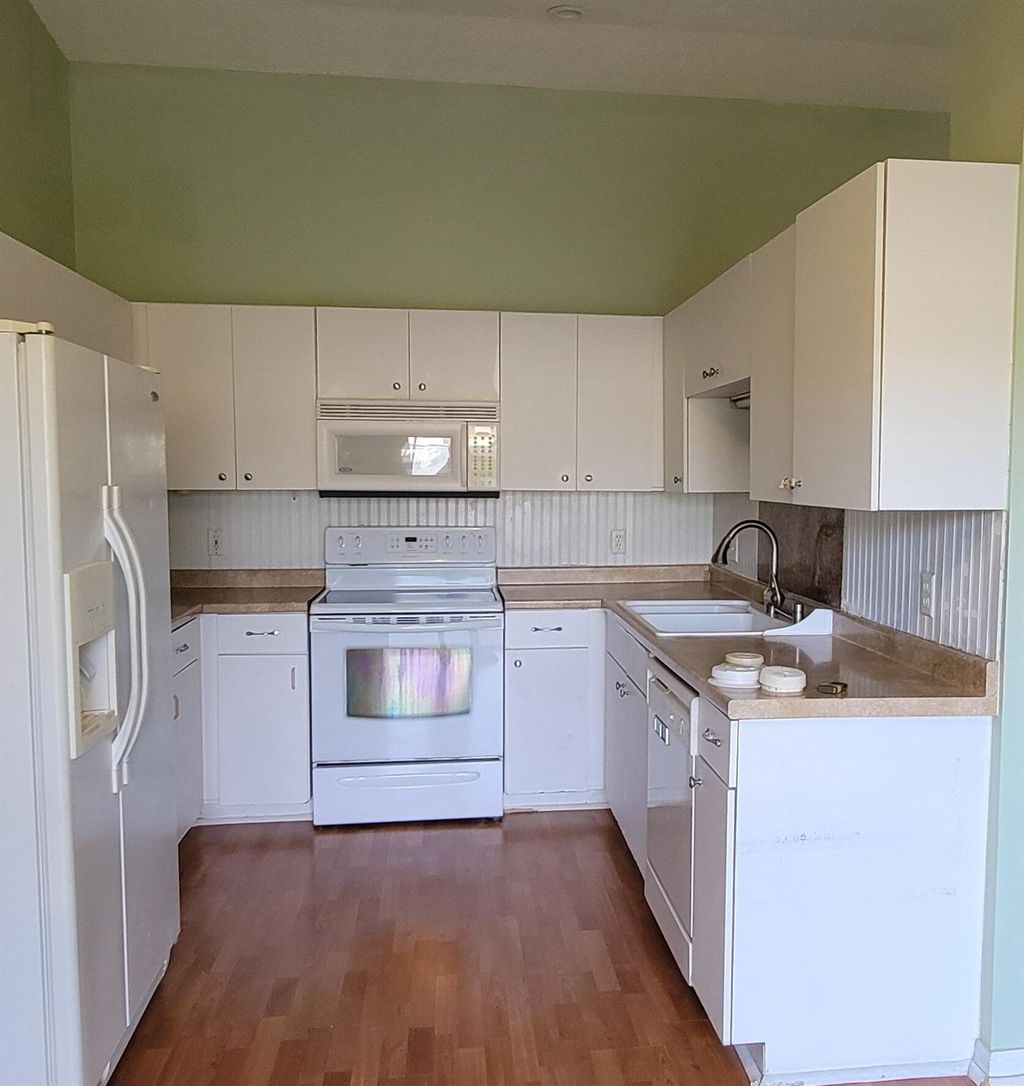 Photo of 435 SW Kabot Avenue, Port Saint Lucie, FL 34953 (MLS # R11043877)