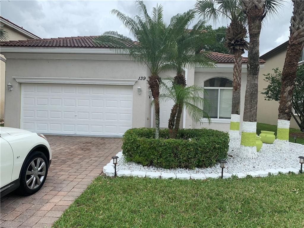 Photo of 139 Two Pine Dr, Green Acres, FL 33413 (MLS # F10372225)