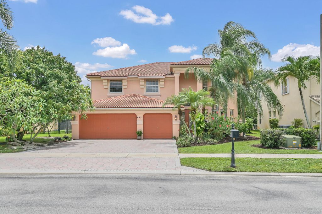 Photo of 6531 Marbletree Lane Ln, Lake Worth Beach, FL 33467 (MLS # R10805476)