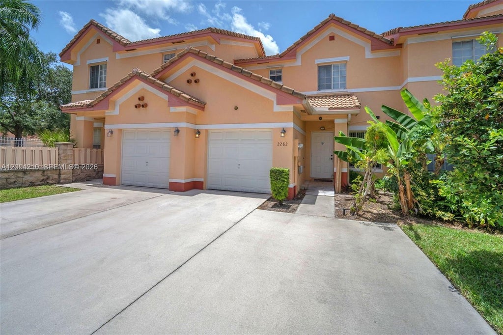 Photo of 2282 SW 87th Terrace, Miramar, FL 33025 (MLS # A12054210)