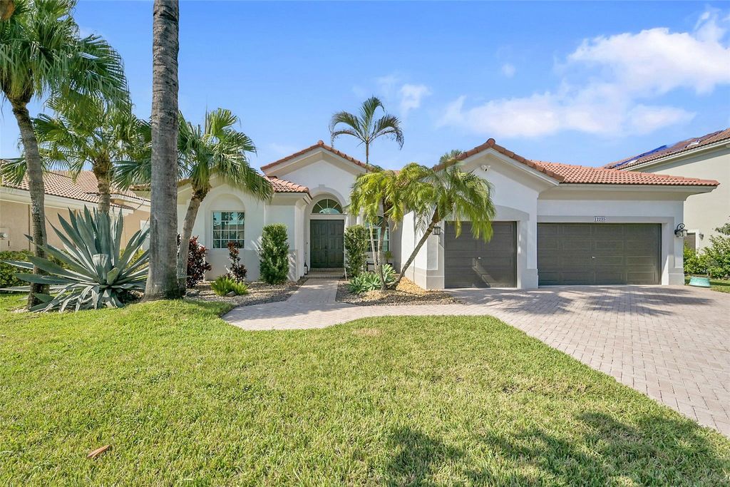 Photo of 12235 NW 49th St, Coral Springs, FL 33076 (MLS # F10531523)