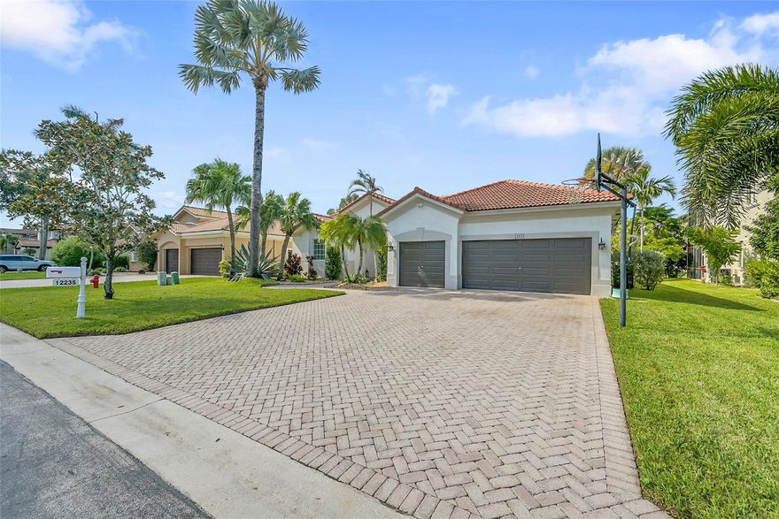 This Exquisite waterfront pool home, a true sanctuary of luxury, nestled within the esteemed Wyndham Lakes gated community Of Bay Pointe. This meticulously remodeled residence boasts 4/2, designed w/a desirable triple split floor plan that optimizes functionality. Every detail has been thoughtfully curated, from all-impact windows that invite abundant natural light to luxury vinyl flooring that lends a sophisticated aesthetic. The primary suite serves as a retreat, featuring walk-in closets & a lavish bathroom that embodies modern elegance. At the heart of the home lies a stunning open-concept kitchen, adorned with quartz countertops & state-of-the-art appliances, ideal for culinary enthusiasts. Outdoor entertaining flourishes w/a spacious grill area, framed by the serene waterfront view.