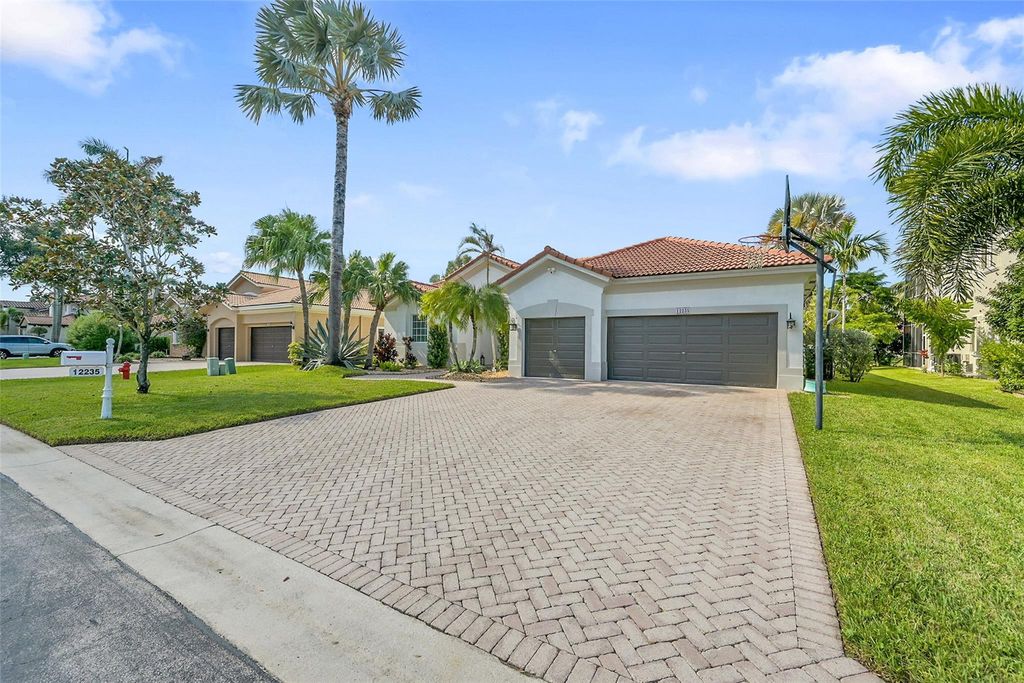 Photo of 12235 NW 49th St, Coral Springs, FL 33076 (MLS # F10531523)