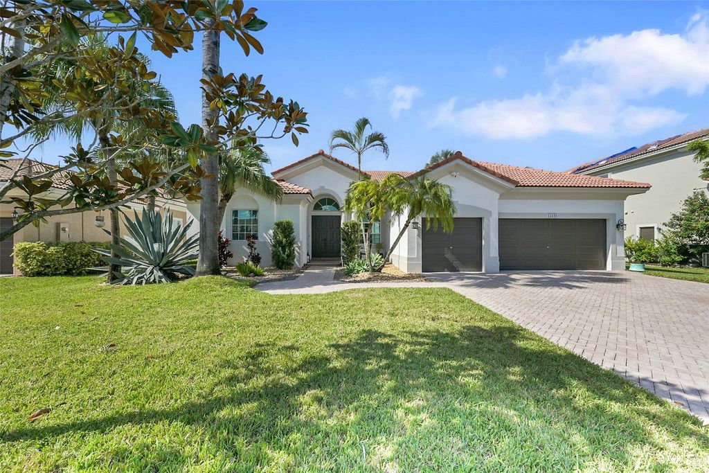 Photo of 12235 NW 49th St, Coral Springs, FL 33076 (MLS # F10531523)