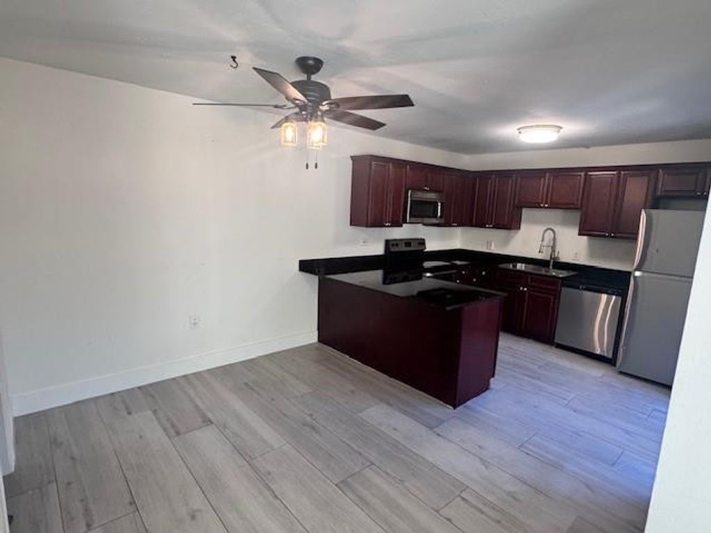 Photo of 1305 13th Lane, Palm Beach Gardens, FL 33418 (MLS # F10498493)