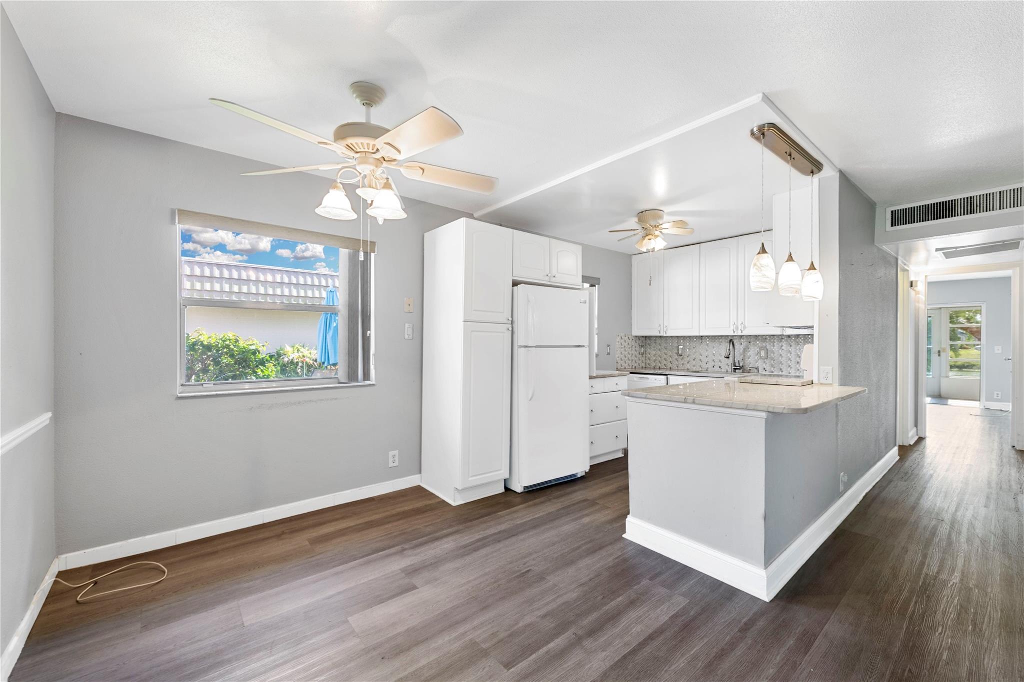 Welcome to this beautifully updated first-floor villa in the highly sought-after guard-gated community of Kings Point. This 2-bedroom, 2-bath home offers serene lakefront views and a brand-new roof, providing peace of mind and modern comfort. Step inside to discover tasteful upgrades throughout, including a modern kitchen, renovated bathrooms, and new flooring. The open layout flows seamlessly into a tranquil patio, perfect for enjoying your morning coffee or unwinding with sunset views over “Bird Island.” Kings Point offers an unparalleled lifestyle w/resort-style amenities, including: live theater shows, indoor/outdoor pools, two golf courses, pickleball courts, bus transportation, and so much more! This villa combines comfort, community, and convenience -the perfect place to call home.