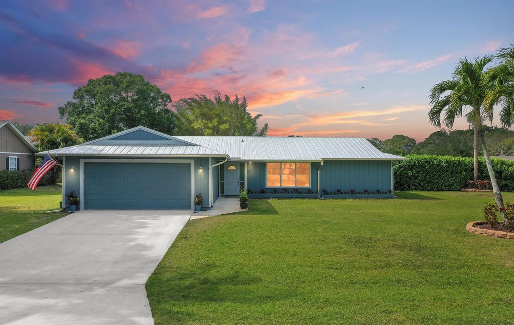 Photo of 5620 SE Paramount Drive, Stuart, FL 34997 (MLS # R11084923)