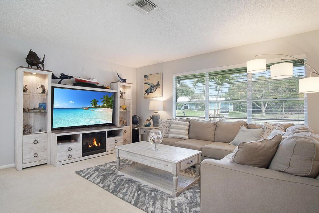 Photo of 5620 SE Paramount Drive, Stuart, FL 34997 (MLS # R11084923)