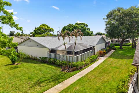 Photo of 1327 Peppertree Trail #Unit A, Fort Pierce, FL 34950 (MLS # B26048902)