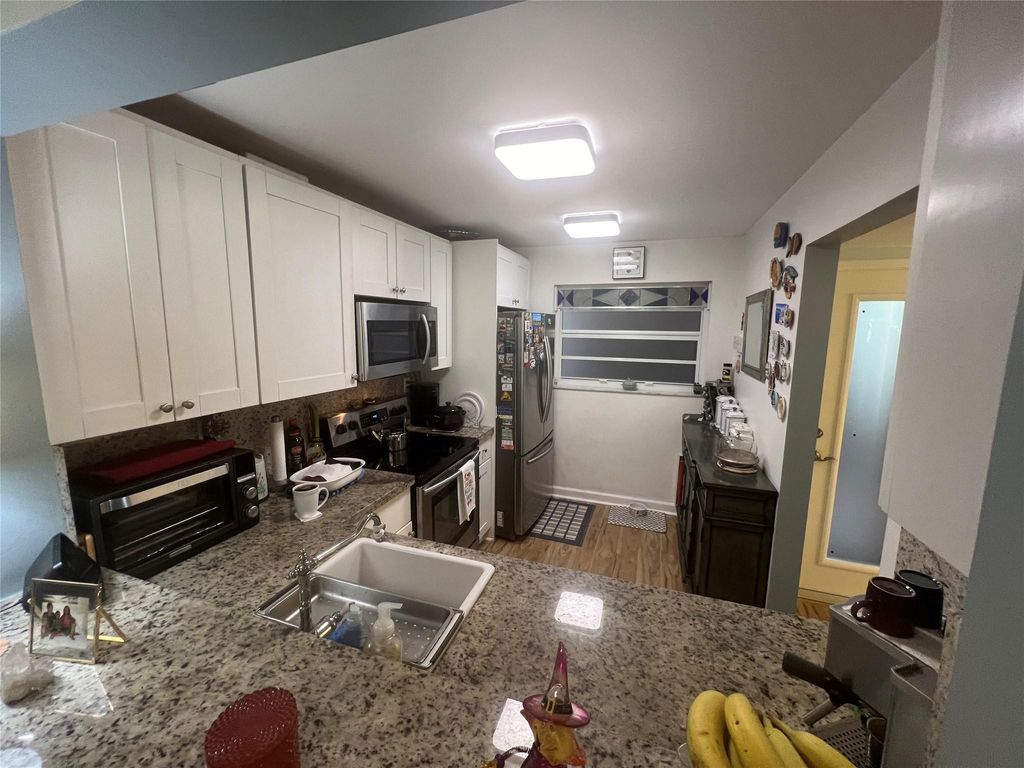 Photo of 9520 Seagrape Drive #103, Davie, FL 33324 (MLS # F10541582)