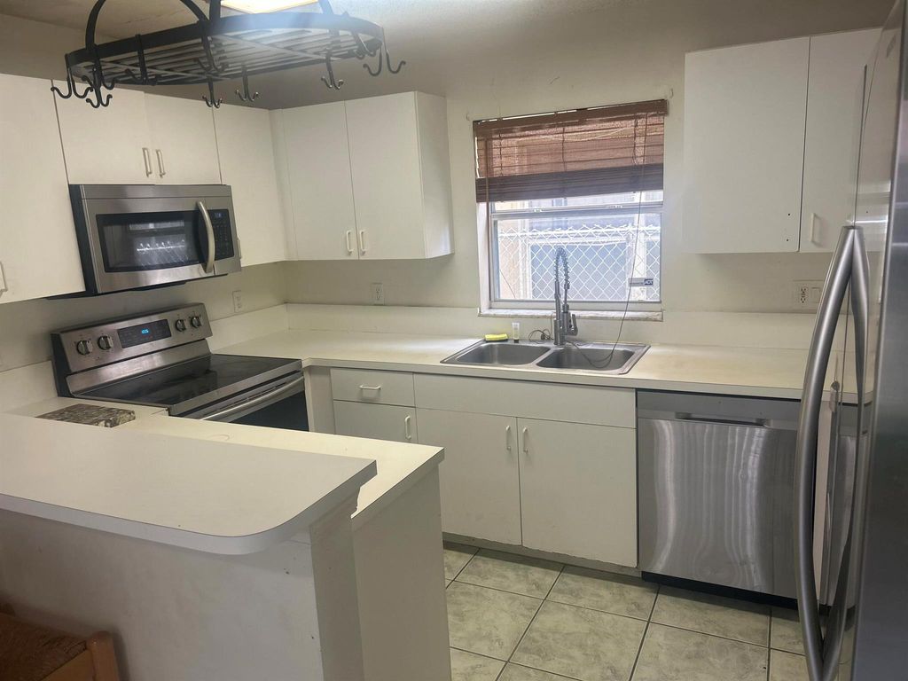 Photo of 522 S E Street, Lake Worth Beach, FL 33460 (MLS # R11097537)